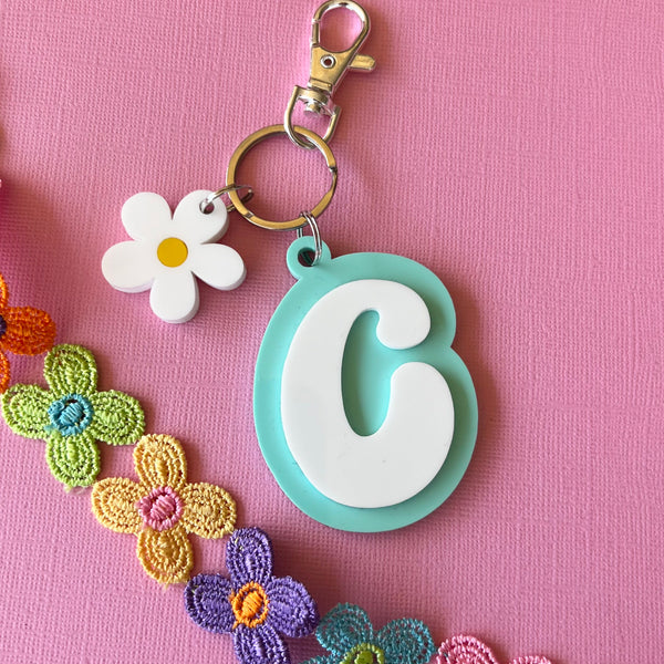 Retro Letter Groovy Key Ring with daisy