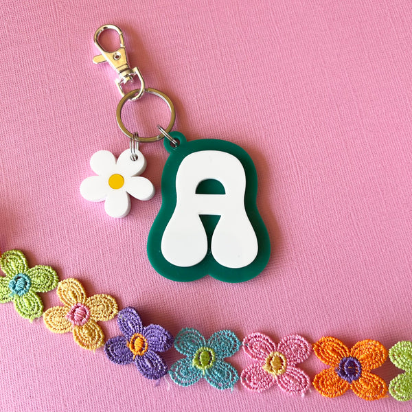 Retro Letter Groovy Key Ring with daisy