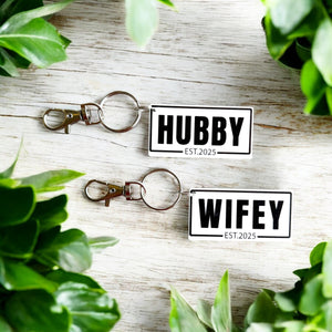 Hubby and Wifey Key Rings
Personalised Key Rings
Acrylic Key Rings
Newlywed Gifts
Custom Key Rings
Established Year Key Rings
Wedding Gifts
Anniversary Gifts
Relationship Keepsakes
Made to Order Key Rings
Unique Couple Gifts
Love and Commitment
Sydney Crafted
Key Ring Set for Couples