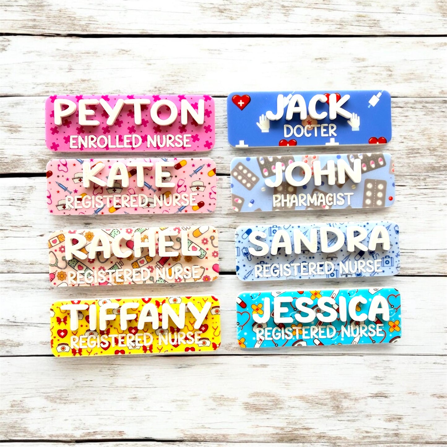 Personalized name tags with different professions on a wooden surface